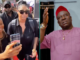 Angela Okorie’s Outfit to Mr Ibu’s Funeral Leaves Netizens Talking: “Wetin She Carry for Back?”