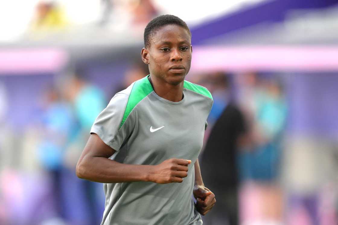 Christy Ucheibe warms up before a game between Nigeria and Brazil at the 2024 Paris Olympics