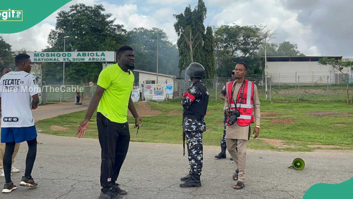 Trending photos: Protester Confronts Police Amid Teargas Barrage in Abuja