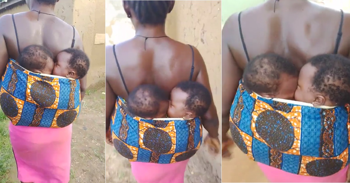 A woman both intrigues and angers the internet as she carries her twins on her back (VIDEO)