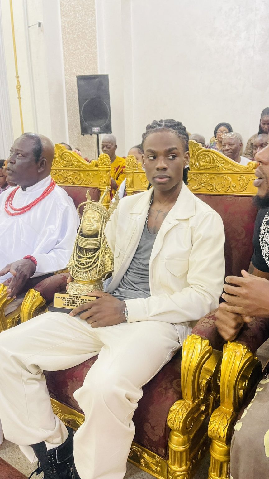 Reactions trail man besides Oba Of Benin's gift to Rema