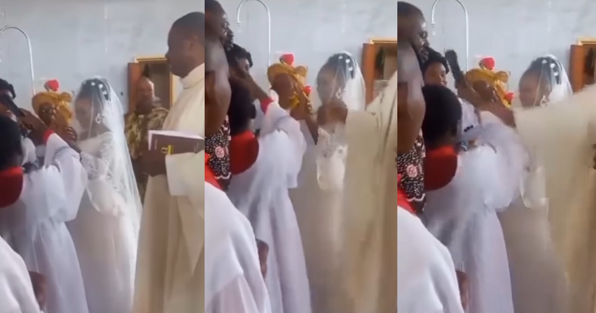 Sh0cking moment a priest kn0cks altar boy on the head for fa!ling to keep the microphone steady as a couple exchanged vows (VIDEO)