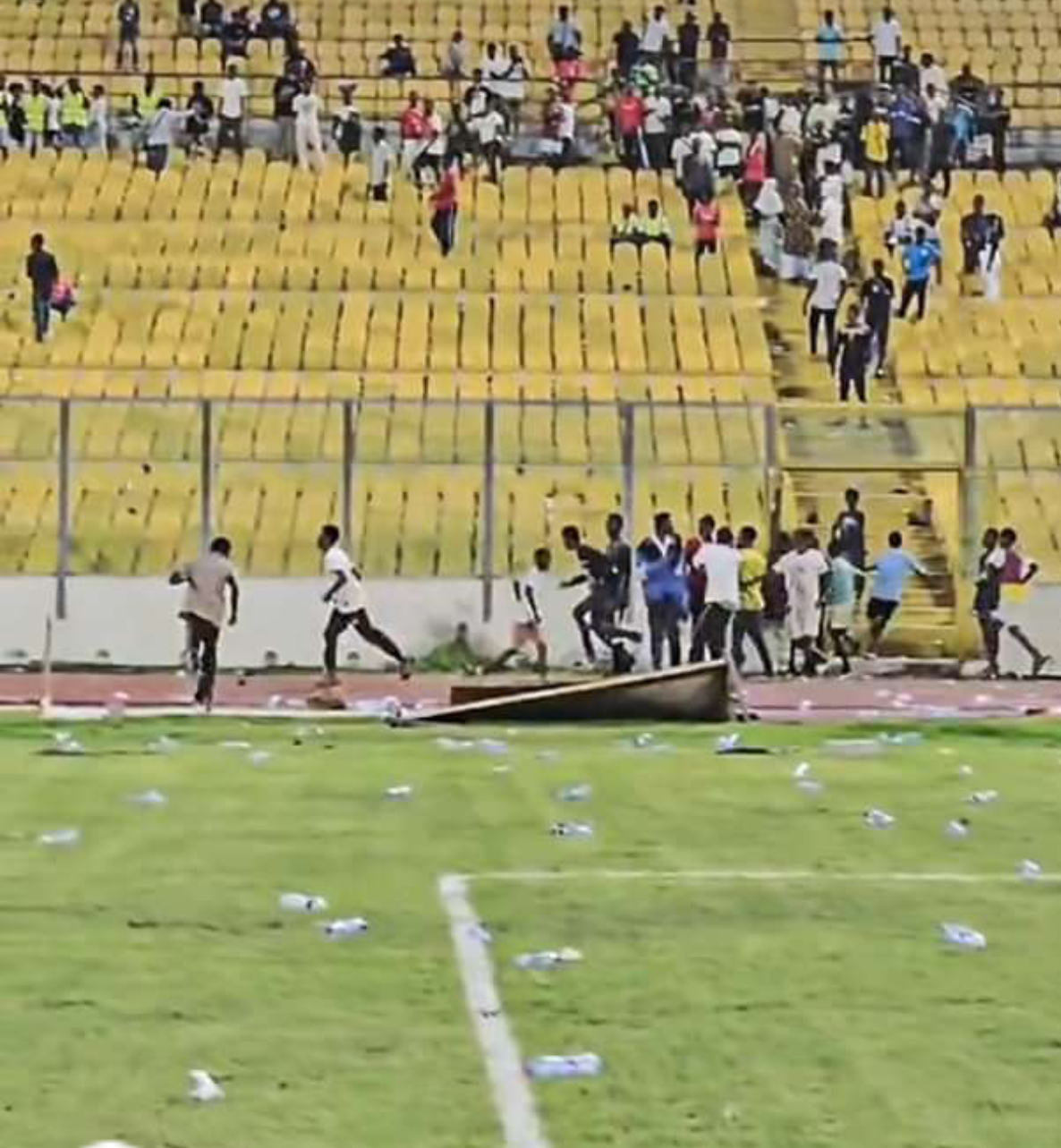 2025 AFCONQ: Angry Ghanaian Fans Invade Pitch After Black Stars Home Loss To Angola