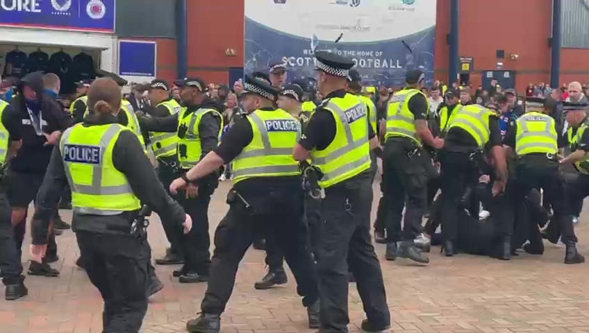 Hooligans clashed with police officers outside Hampden