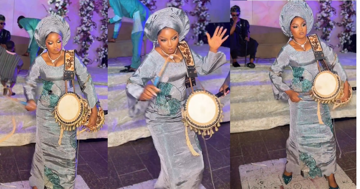 Beautiful bride stún guests with her talking-drum skill (VIDEO)