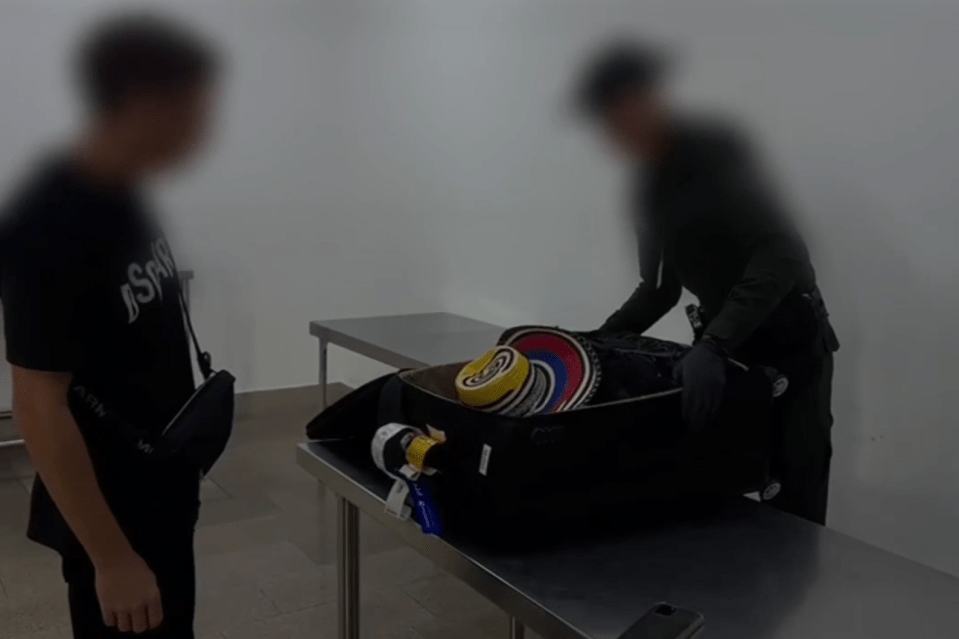 Cops found two kilograms of cocaine smuggled under a Mexican sombrero in his suitcase