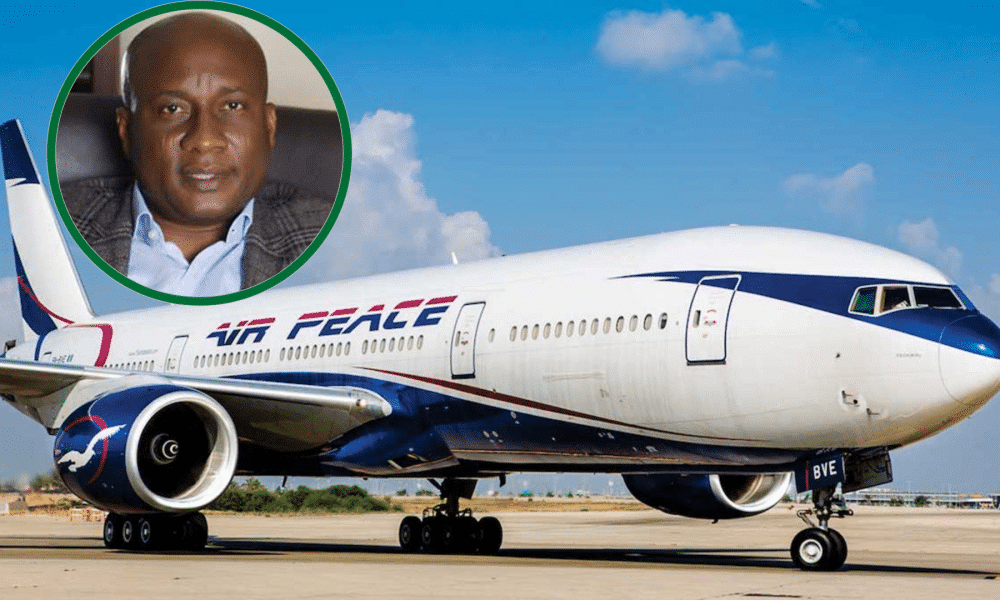 Airpeace aircraft on the tarmac with a picture of the airline CEO, Allen Onyema