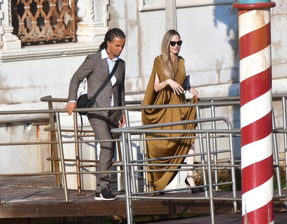 Angelina and Akala leaving a Venice hotel in August