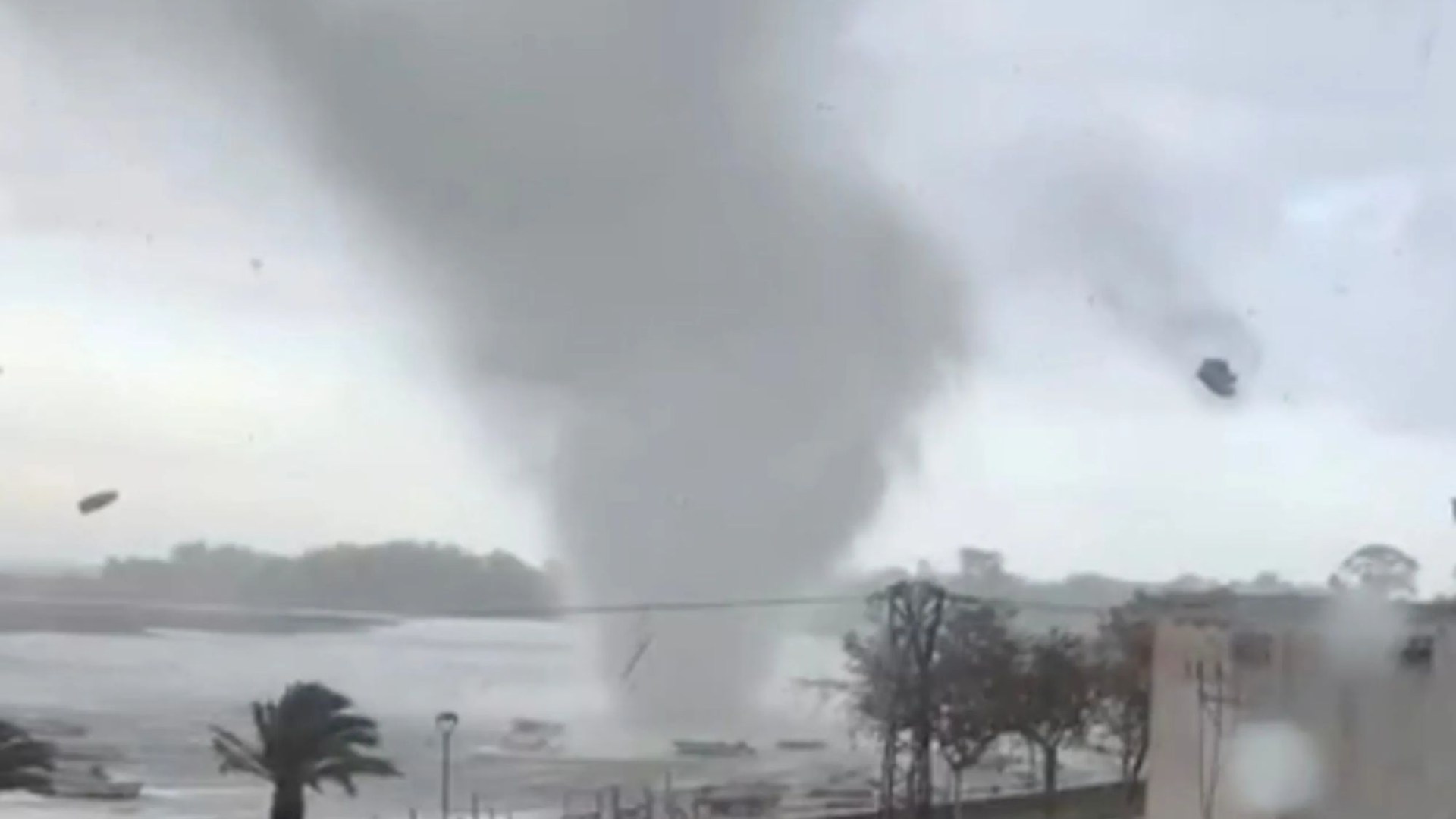 Horror moment TORNADO injures two in Spain amid flood nightmare with 205 killed & temporary morgue to gather the dead