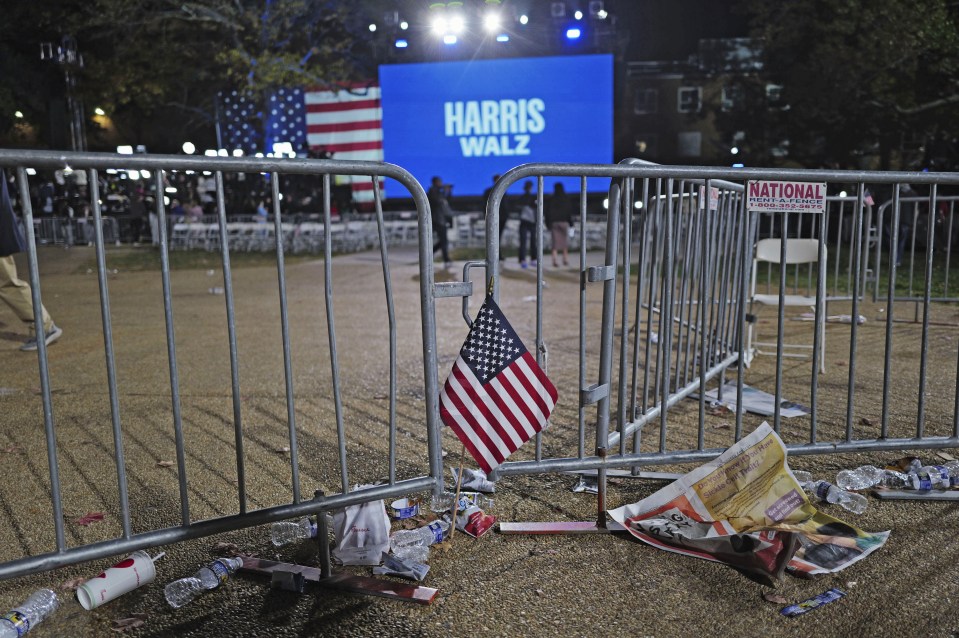 Rubbish is strewn over the floor at Harris' deserted campaign grounds with discarded American flags