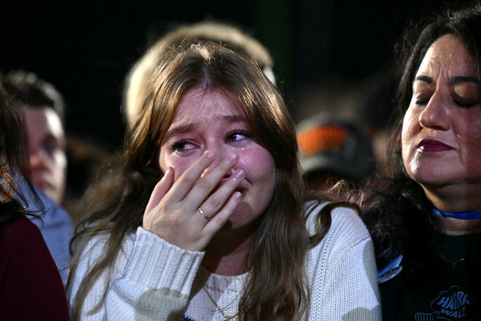 A young woman cries as results pour in for Trump on election night