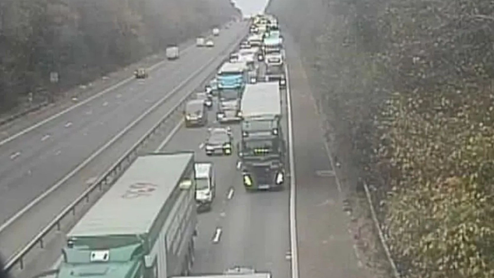 Rush hour chaos as motorway shut in both directions all day after horror deadly crash between two lorries & three cars