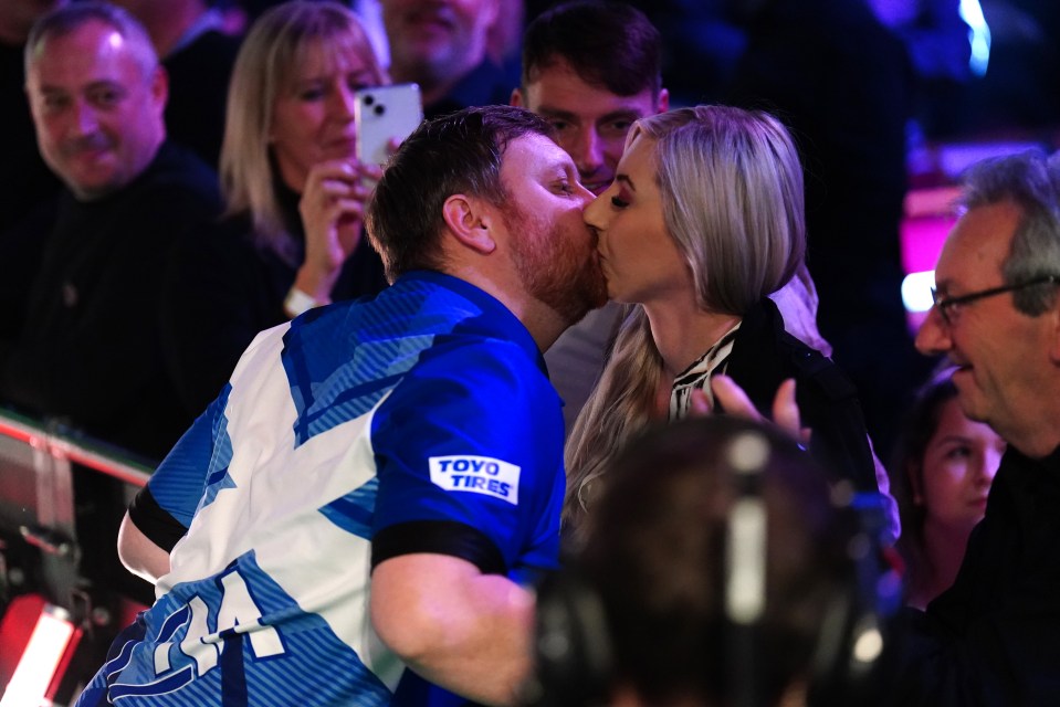 Fallon Sherrock and Cameron Menzies (left) embrace at Ally Pally