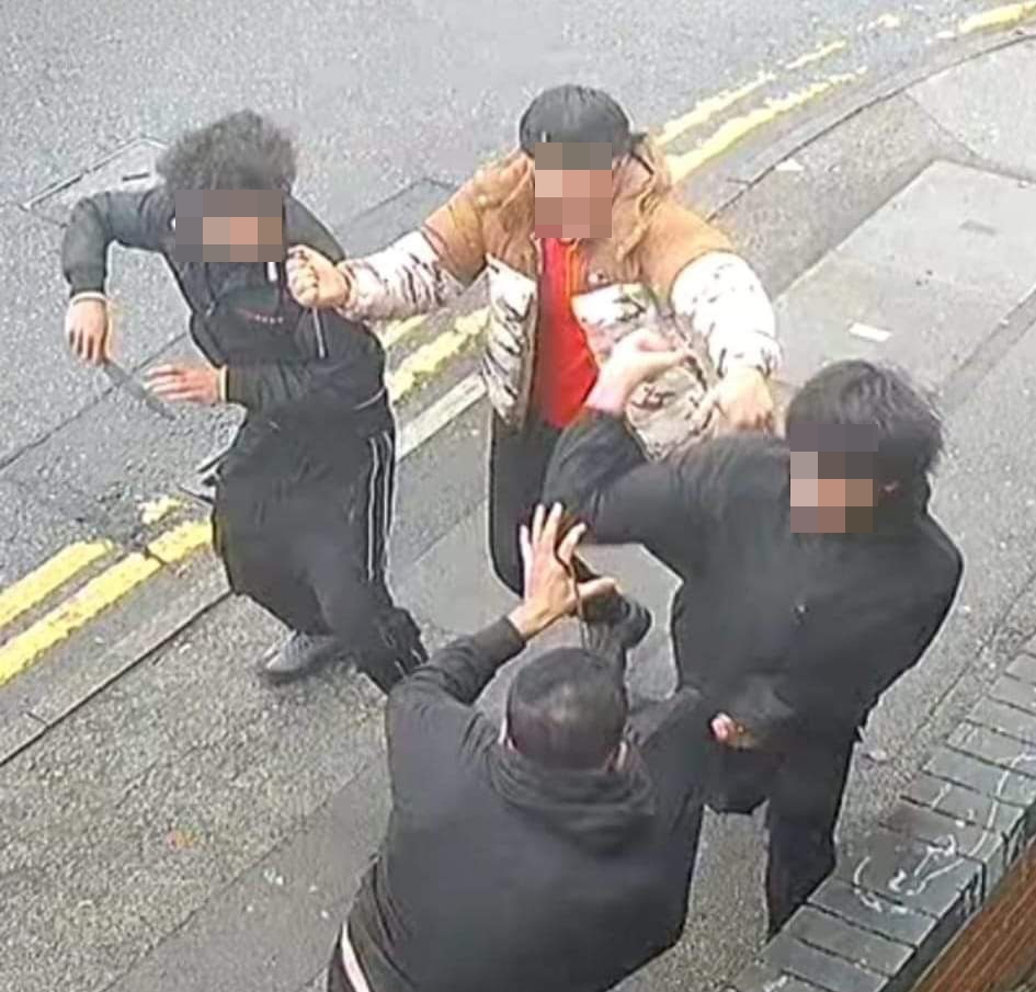 A man was stabbed on a busy street in a terrifying gang attack