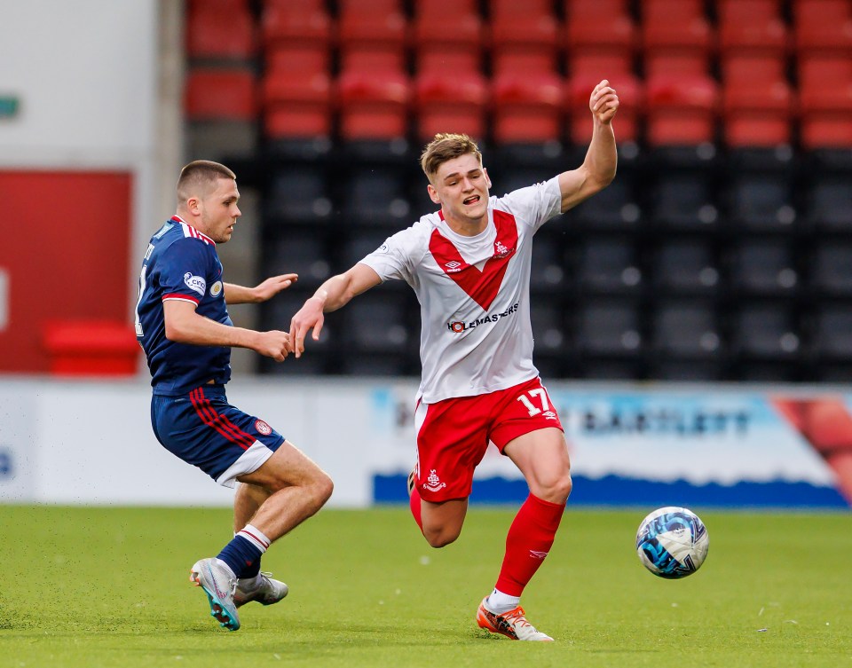 Justin Devenny (right) in action for Airdrie