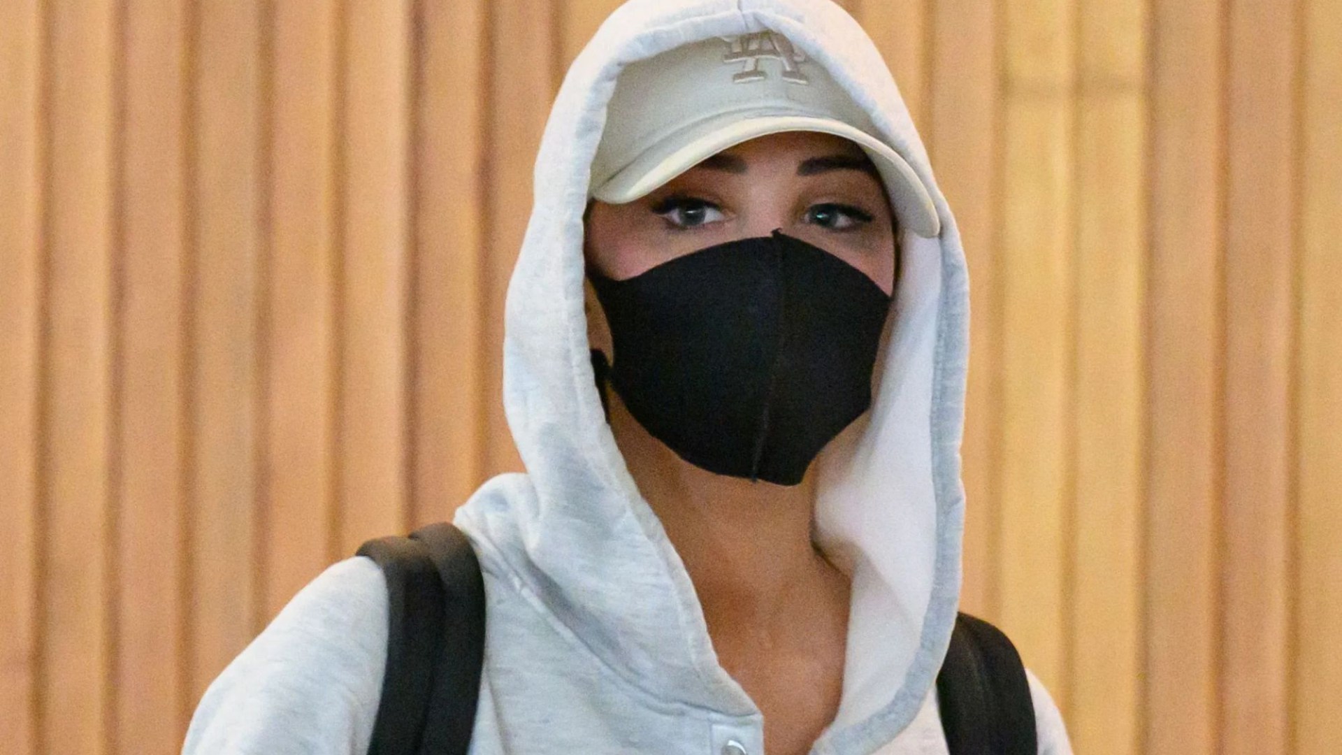 Tulisa keeps a very low profile as she lands in Australia ahead of I’m A Celebrity