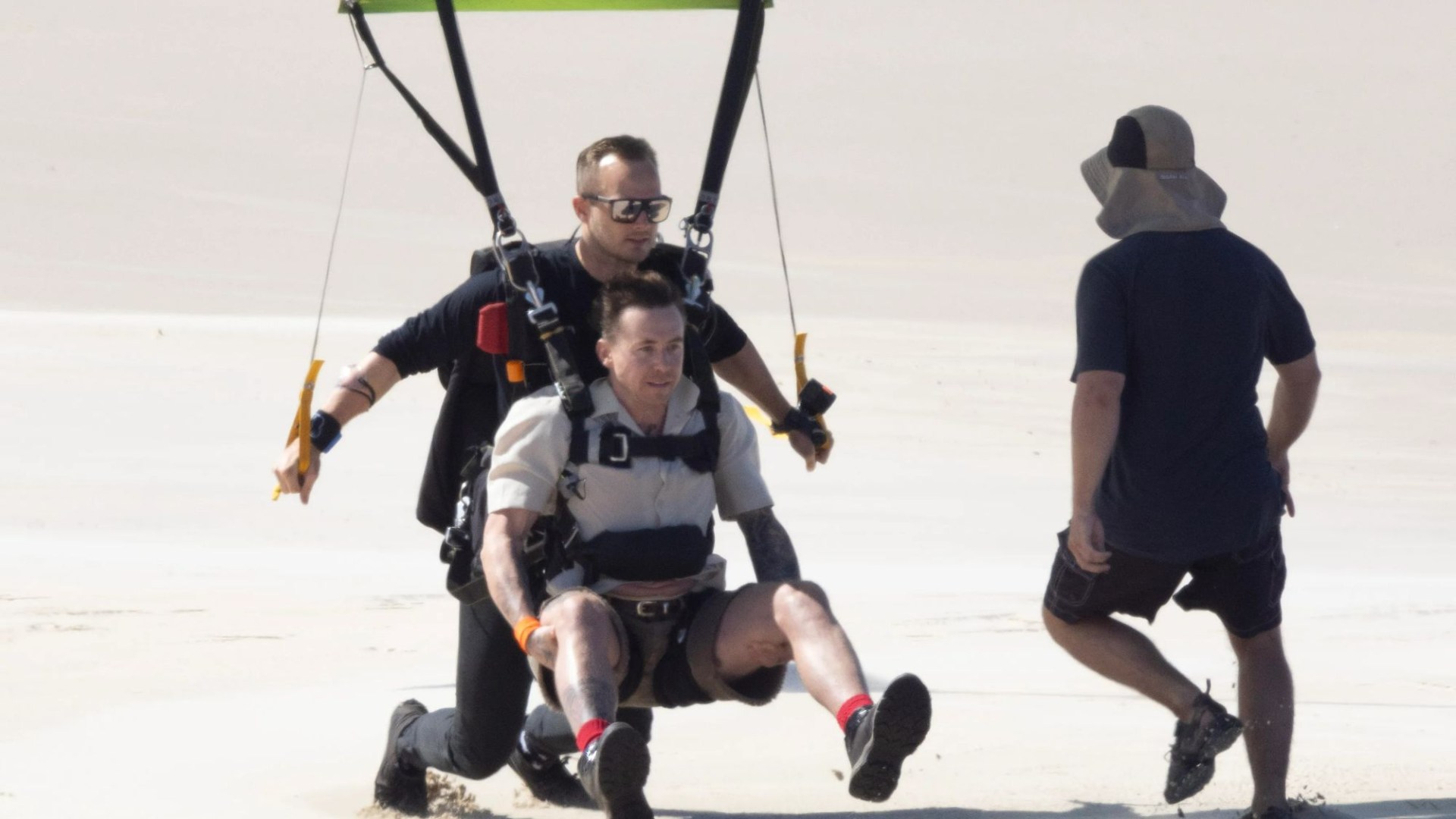 See terrifying moment Danny Jones and Tulisa skydive into I'm A Celeb camp from 10,000ft in first trial