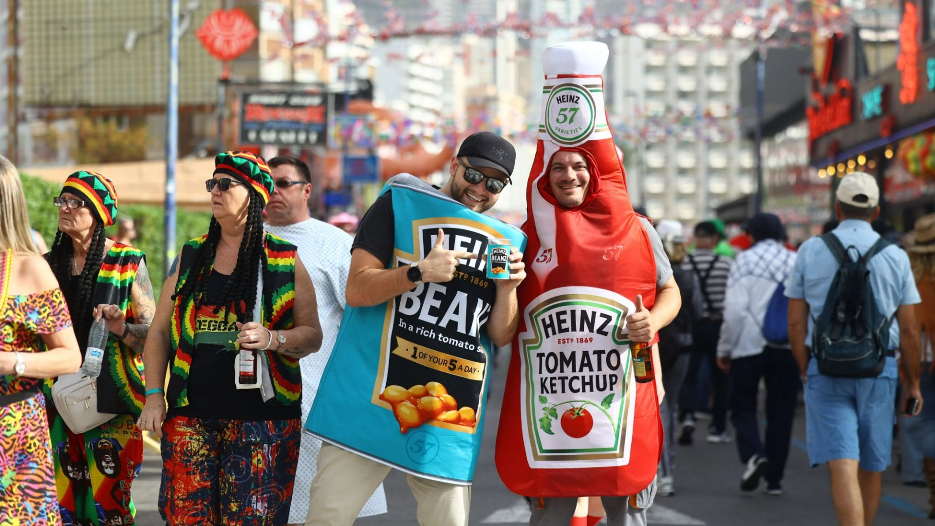 Watch as 30,000 Benidorm Brits take to streets & march in fancy dress to raise funds for horror Spain storm victims