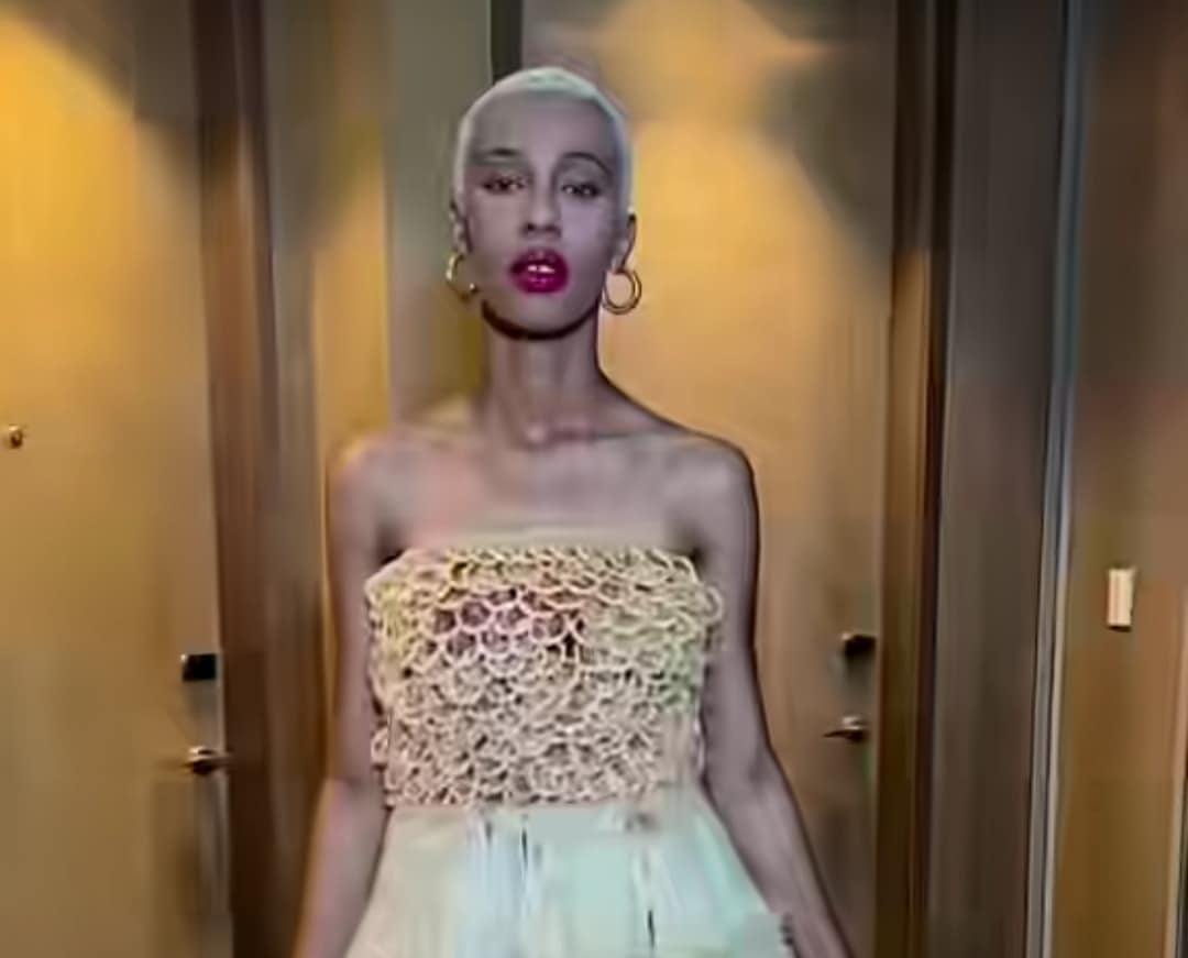 Congolese lady wows internet with unique dress made entirely from condoms