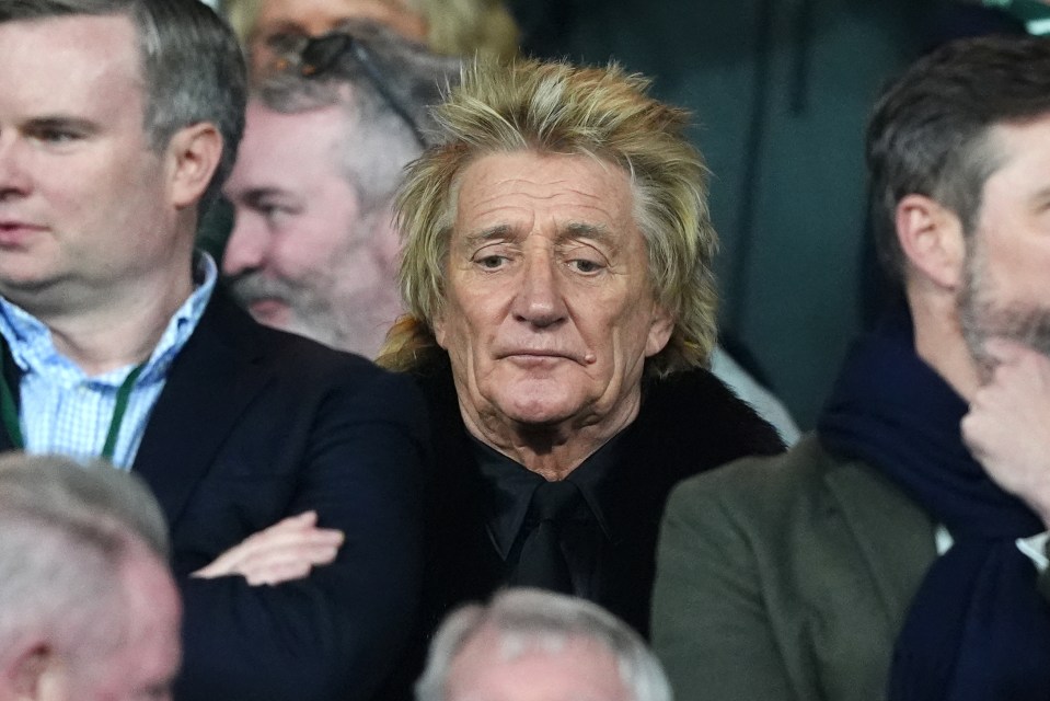 Singer Rod Stewart (centre) in the stand