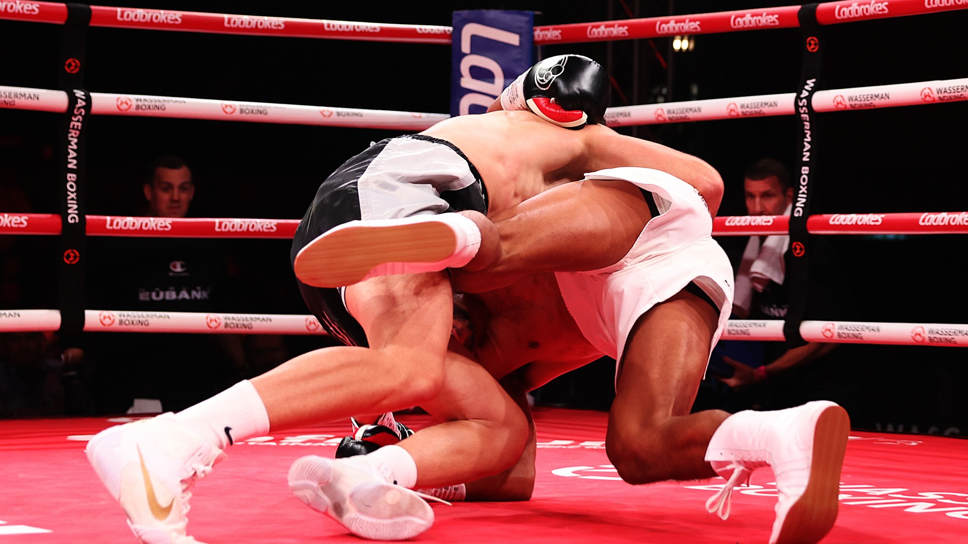 Chris Eubank's nephew wrestled to ground FOUR times as boxing clash turns into wild 'MMA fight'