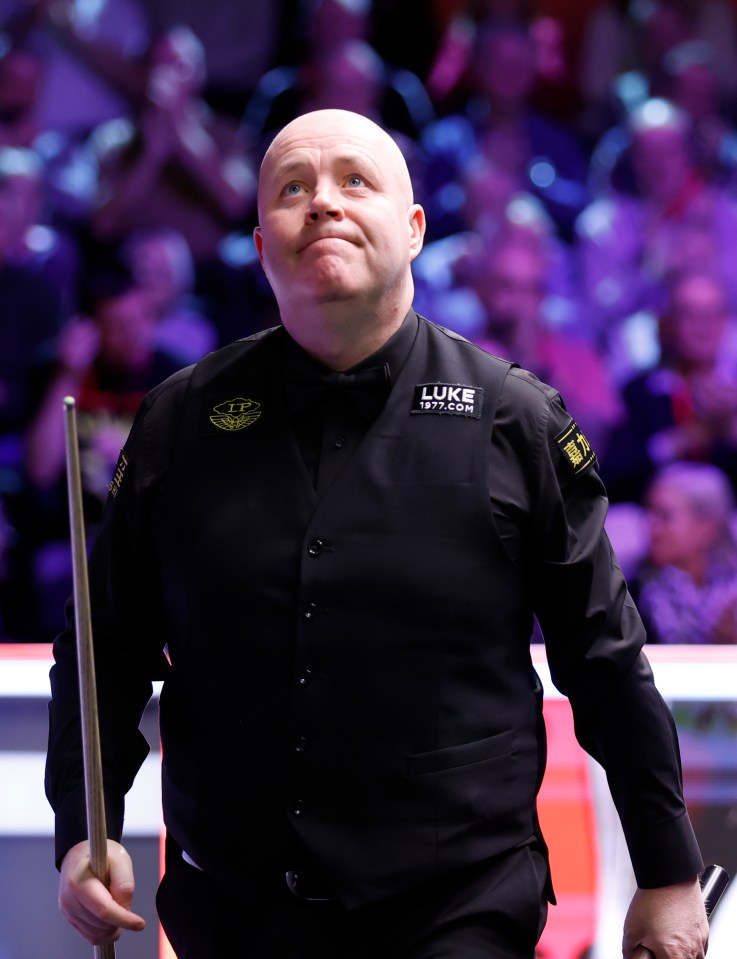 John Higgins his 6-0 victory over He Guoqiang at the York Barbican