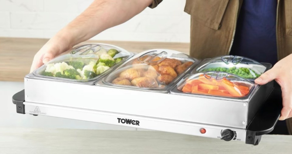 The four-tray buffet server keeps food warm