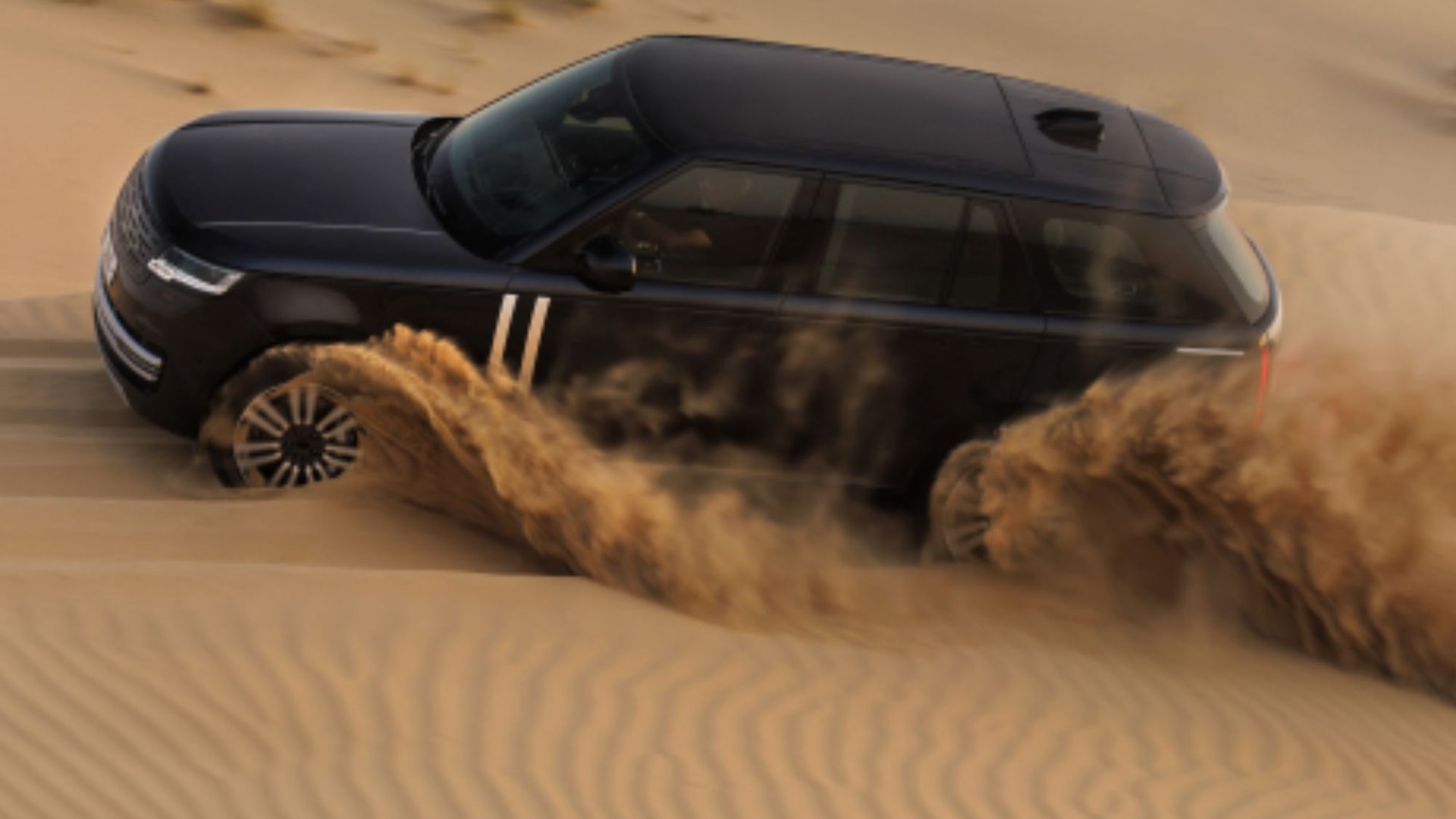 Watch Range Rover test new EV by shooting it up 300ft ‘Big Red’ sand dunes in 50C heat on world’s starkest terrain