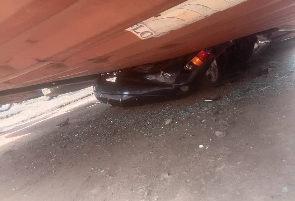 Couple Escapes Death As Container Falls On Stationary Car