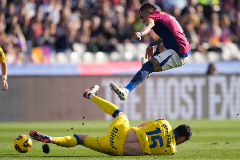 Raphina hurdles a tackle from Scott McKenna