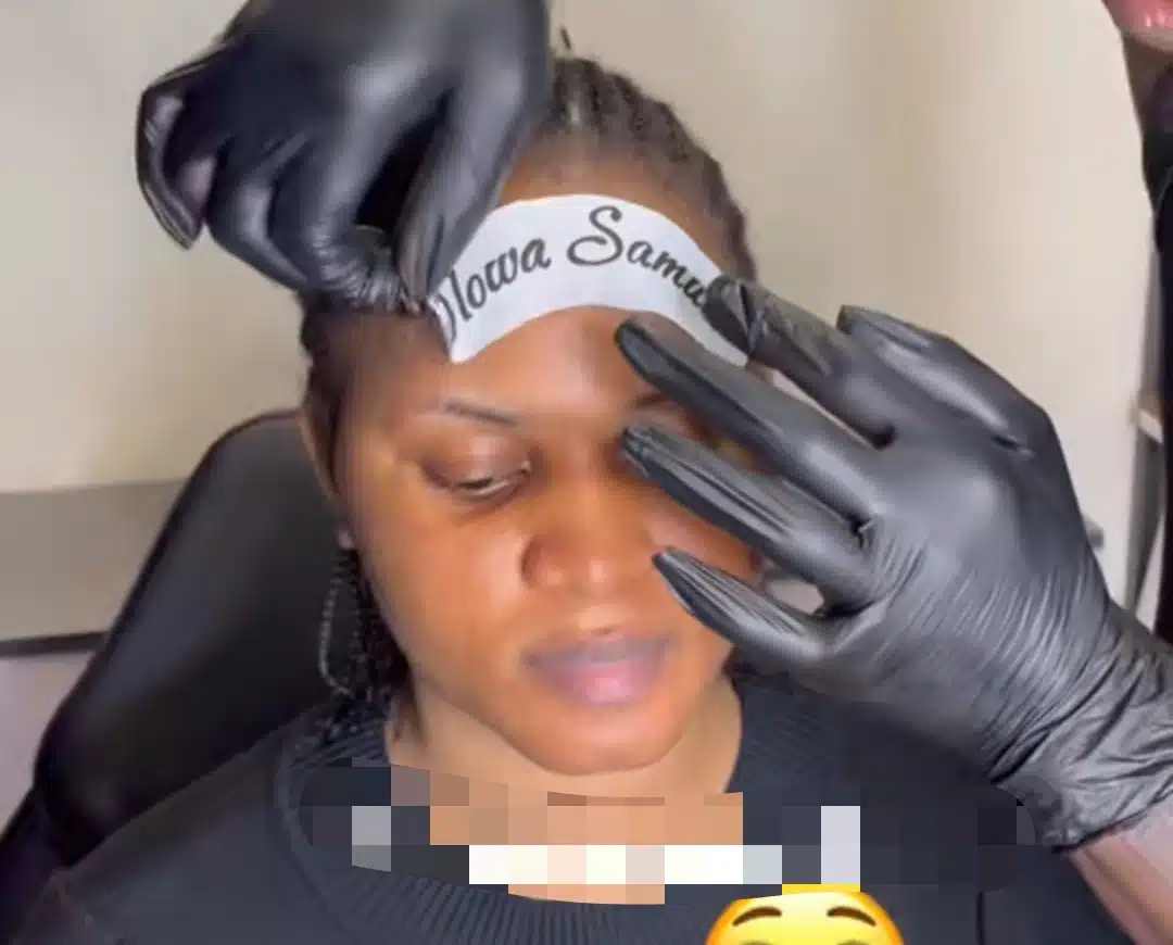 Boyfriend permanently tattoos his name on girlfriend's face.