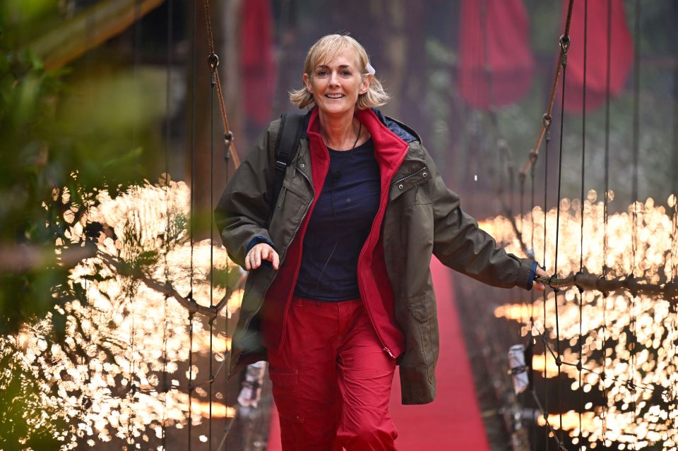 A rain-soaked Jane walks across the famous bridge after her eviction