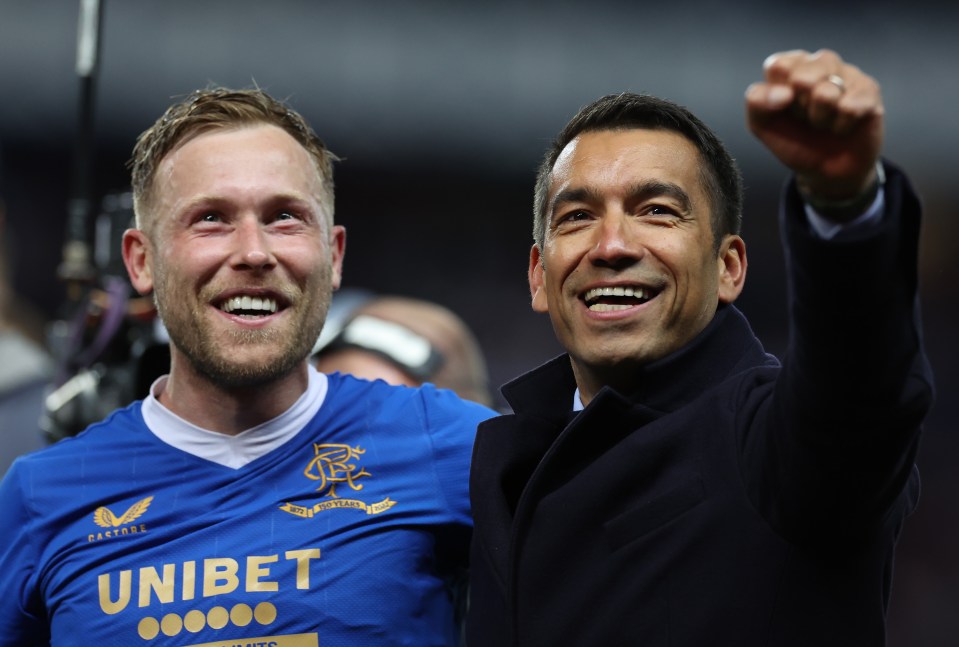 Van Bronckhorst (pictured with Scott Arfield) led Rangers to the Europa League final and Champions League group stage