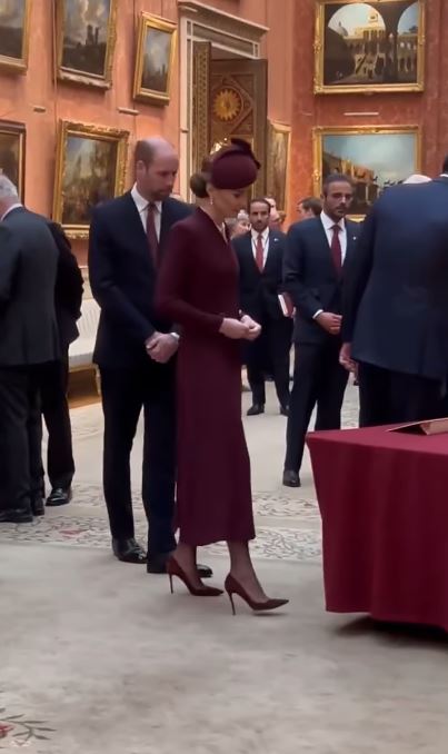 Kate later switched her boots for stiletto pumps in the same colour