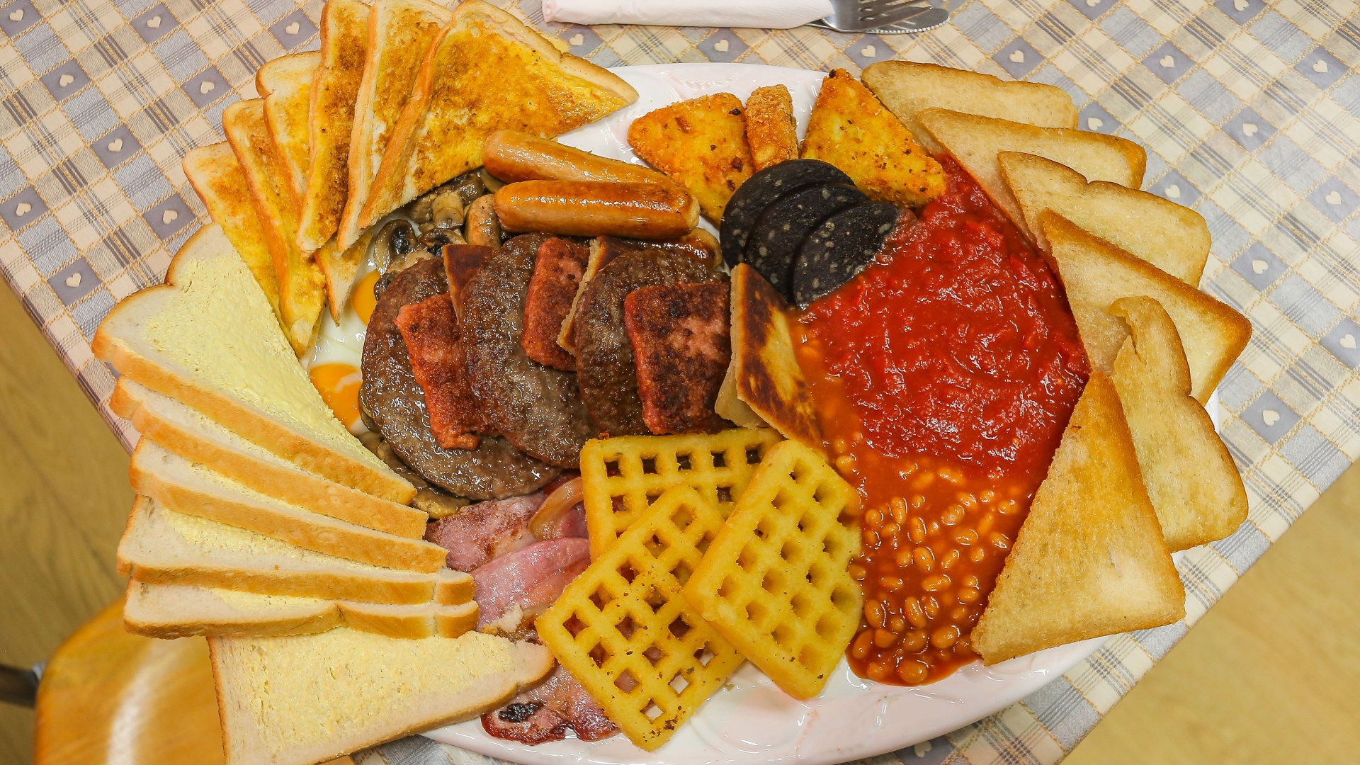 Greasy spoon serving 45-piece fry up is voted Britain's best builder's cafe - is it your local?