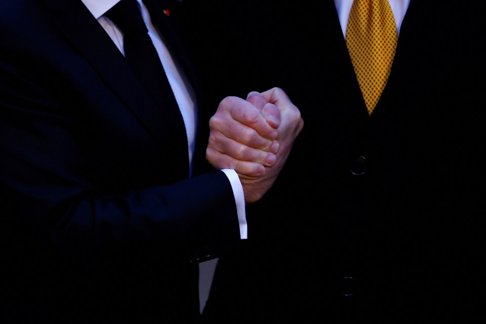 Trump grabbed Macron's hand with a vice-like handshake