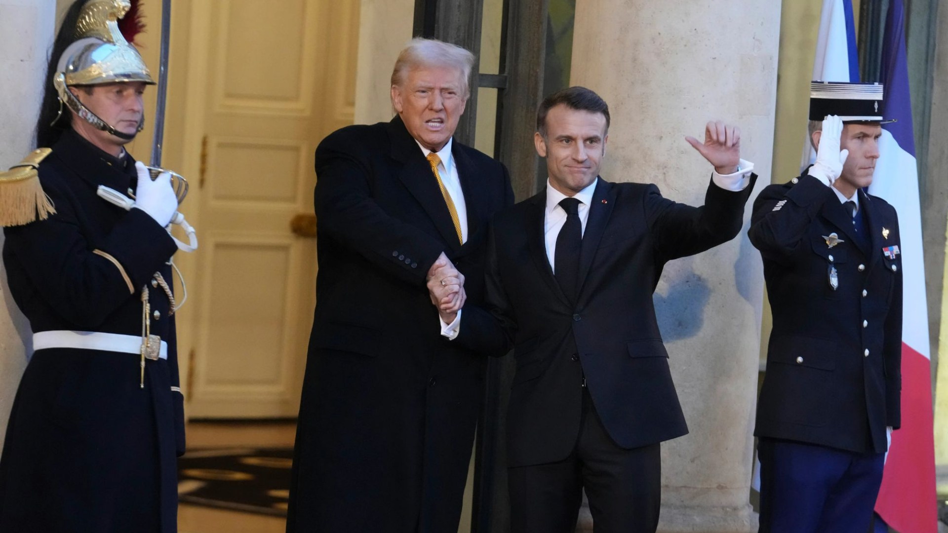 Trump hails ‘great relationship’ with Macron as French president greets him with vice-like handshake – The Scottish Sun