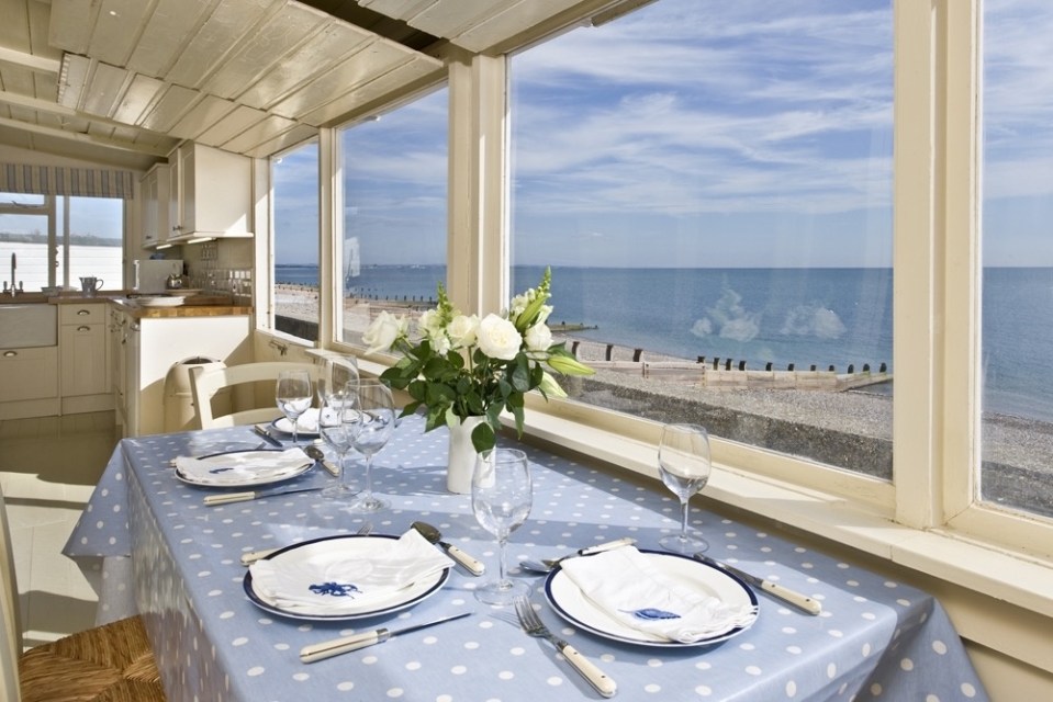 The quirky holiday home sits on the seafront and boasts panoramic views