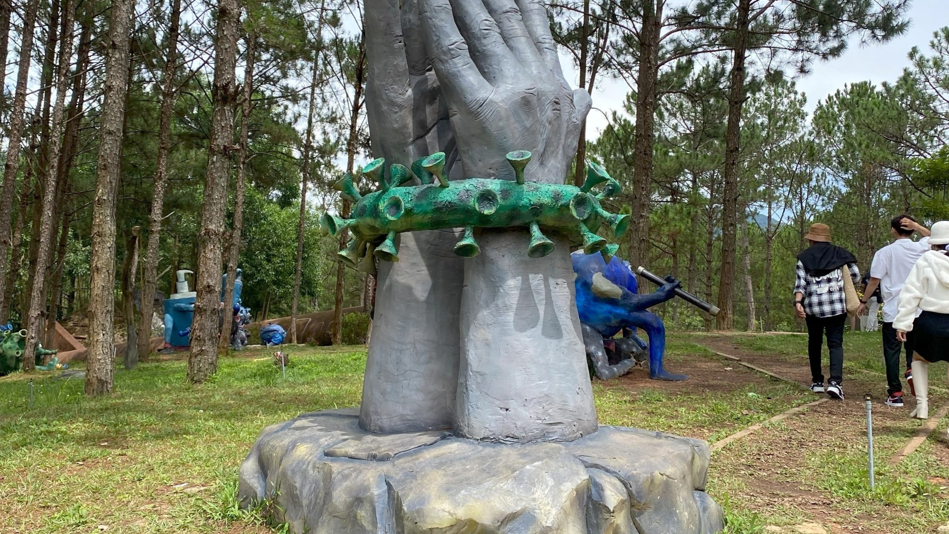 Inside Covid THEME PARK with ghoulish fairground dedicated to outbreak with giant viruses & creepy pandemic clock