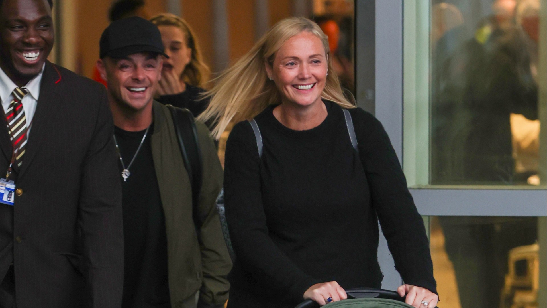 I'm A Celeb's Ant can't stop smiling as he lands in UK with son & Anne-Marie - as Alan Halsall reunites with daughter