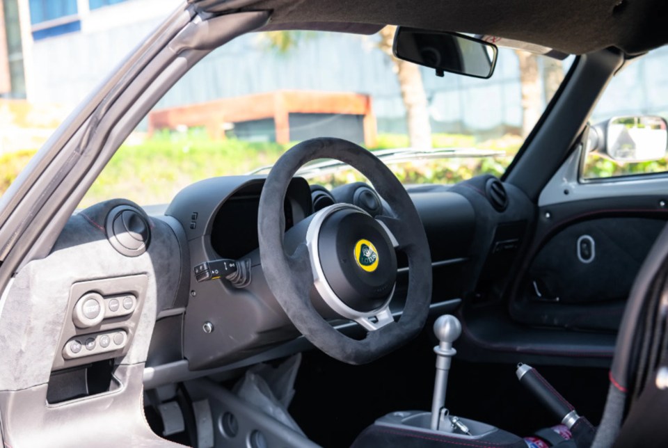 Images show the stylish road-legal race car finished in Vortex Grey over a Black Alcantara and leather cabin