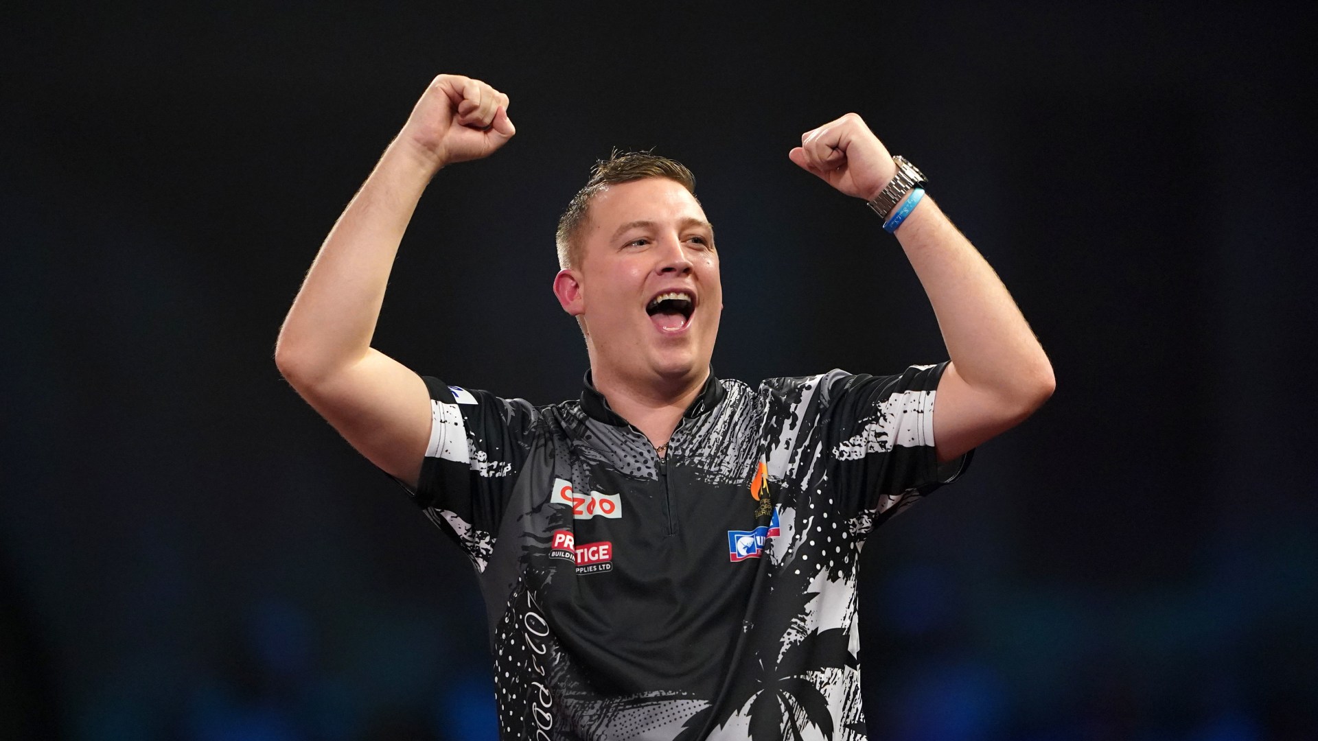 Who is English darts star Chris Dobey?