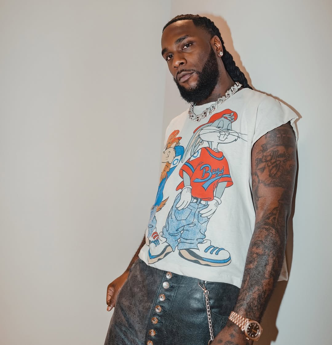 Burna Boy gifts his PA, King Manny Tesla Cyber truck 