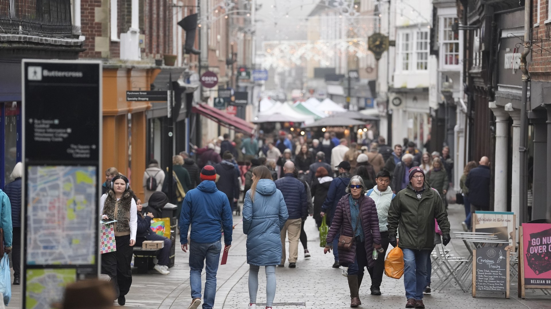 'Absolute carnage' as thousands of Xmas shoppers make last-dash to high streets & form HUGE queues outside supermarkets