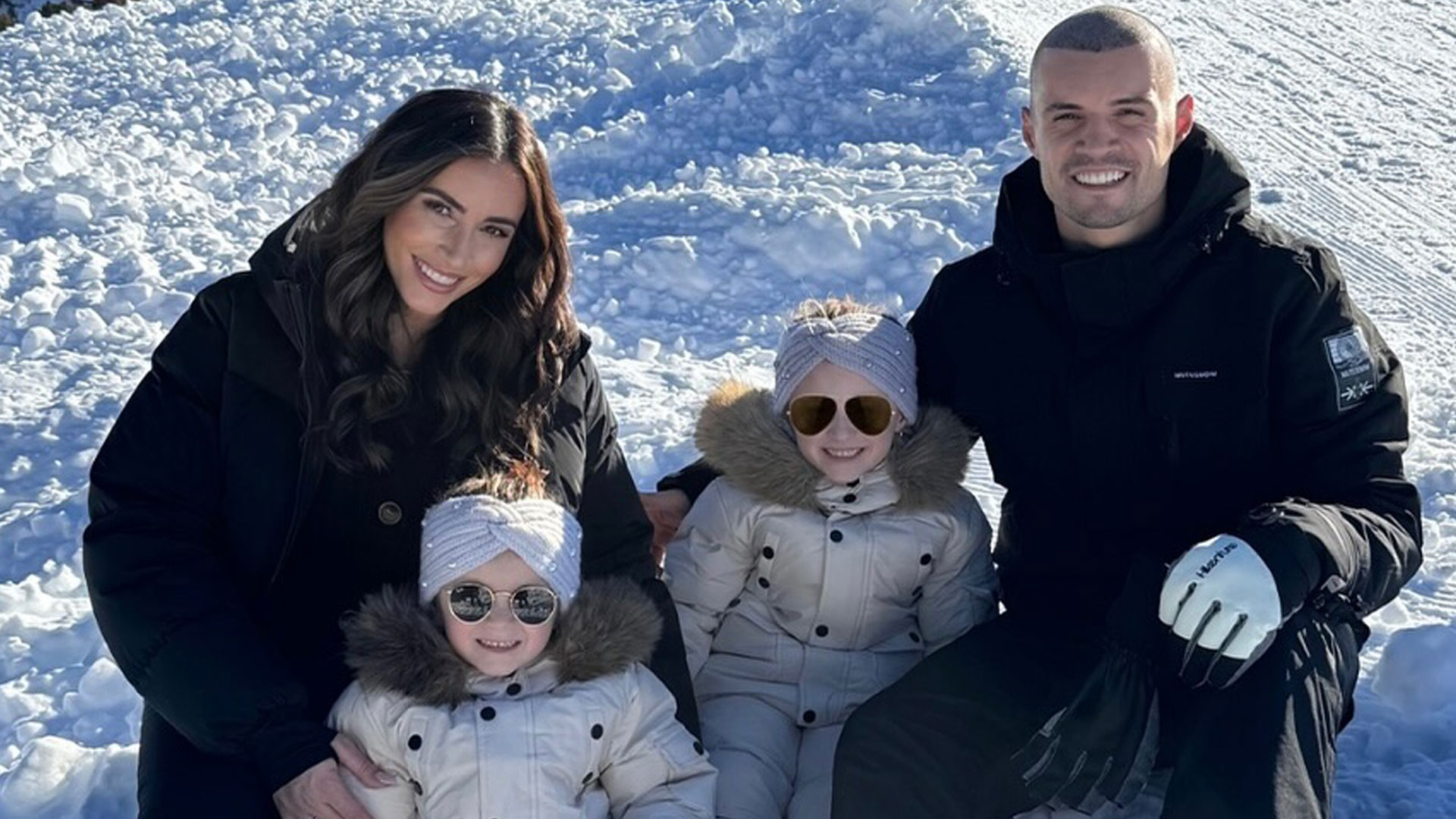 Former Arsenal star Granit Xhaka shows off dramatic new look as he and family go skiing during Christmas holiday