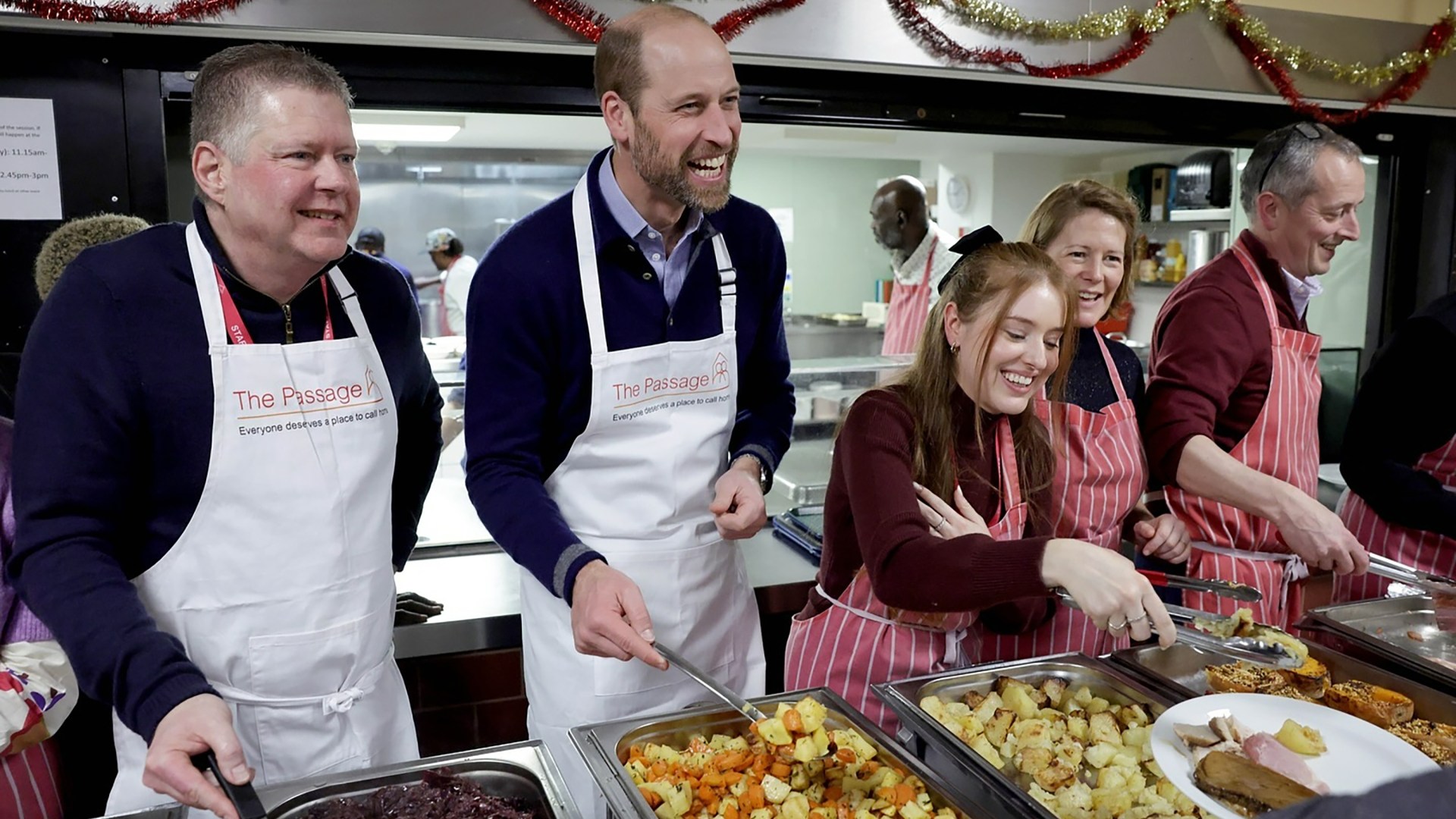 Beaming Prince William serves Christmas lunch at homeless shelter 30 years after first visit with mum Diana