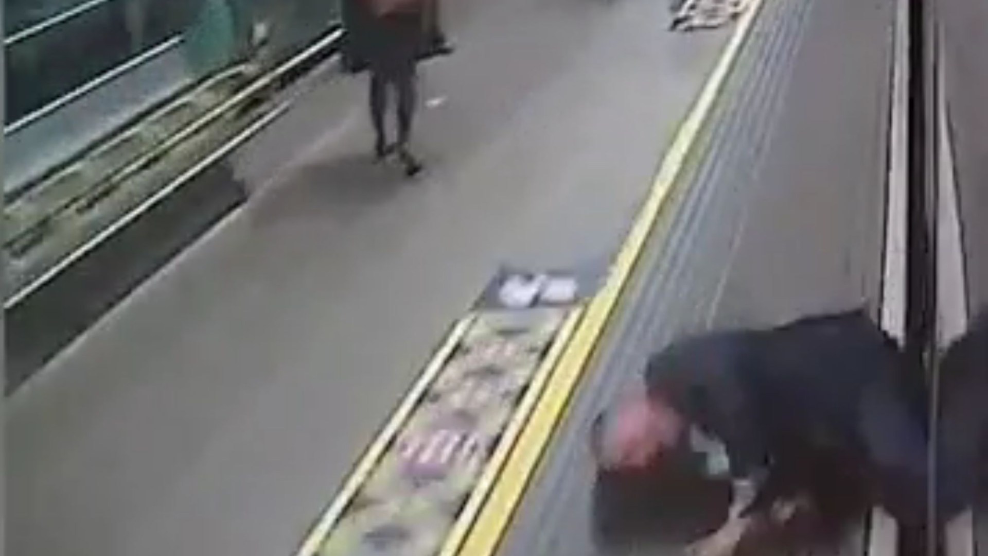 Moment passenger nearly dragged to his DEATH by train pulling into station as horrified travellers helplessly watch