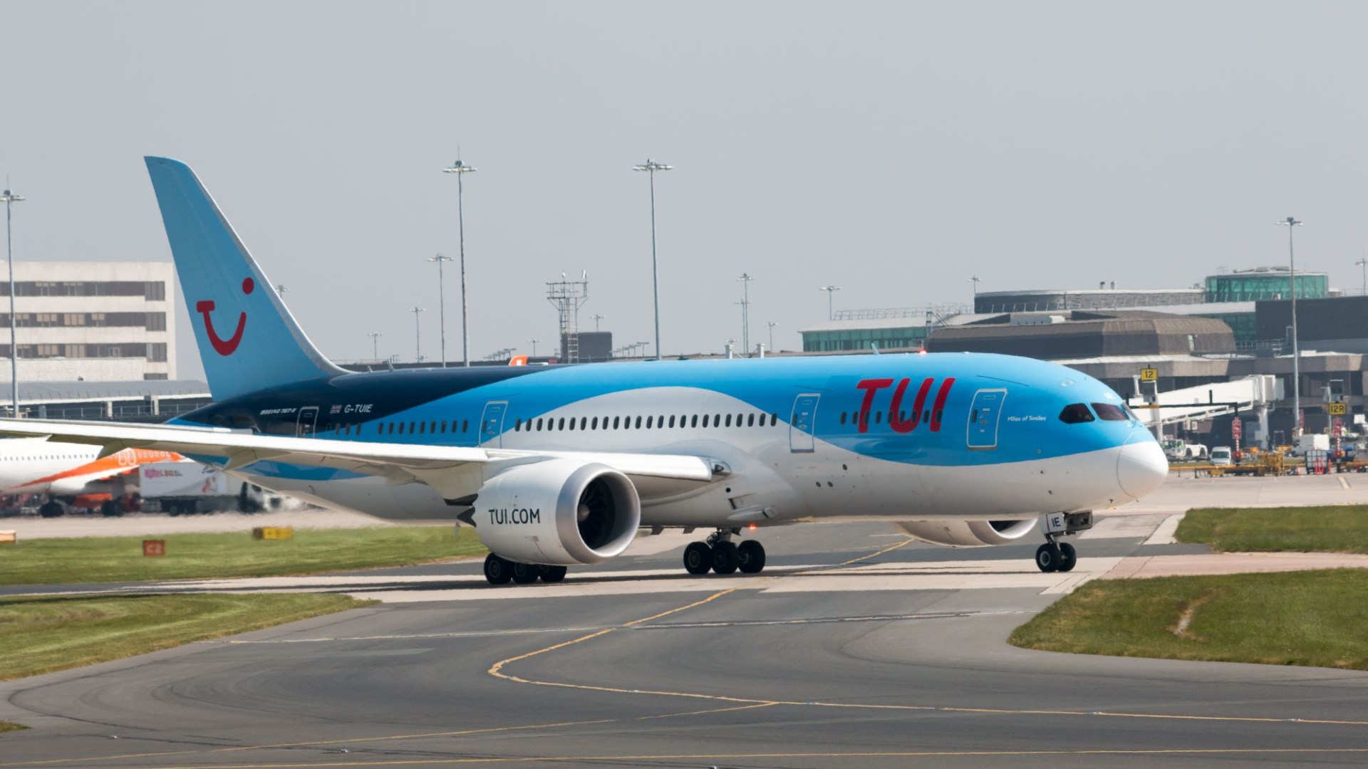 TUI flight attendant rushed to hospital after ‘falling from plane’ at UK airport – as probe is launched – The Scottish Sun