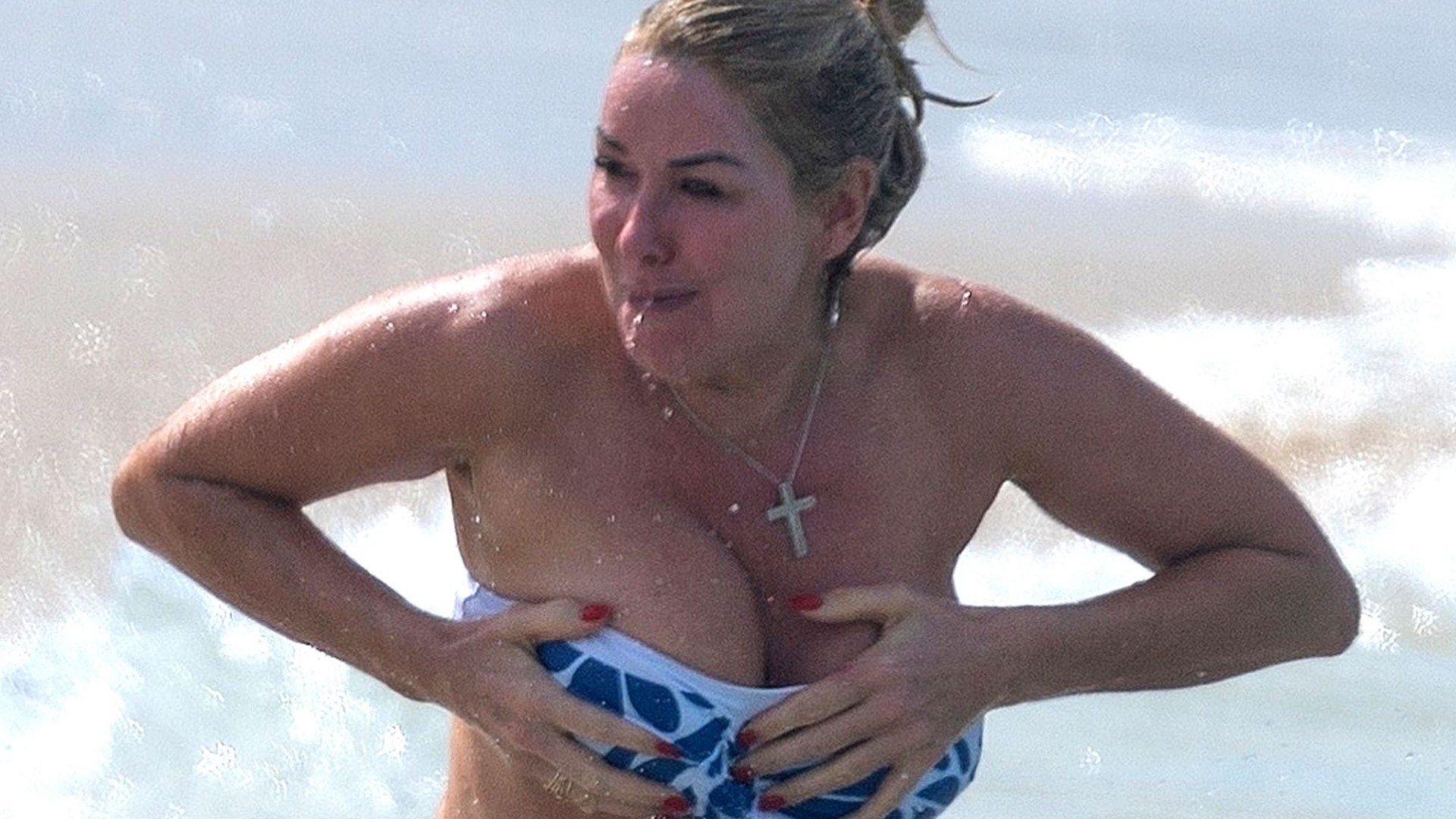 Claire Sweeney nearly spills out of her bikini as she soaks up the sun in Barbados after split from Ricky Hatton