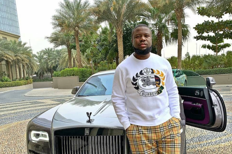 Lady sprays Segun Johnson money at party on behalf of Hushpuppi via Facetime